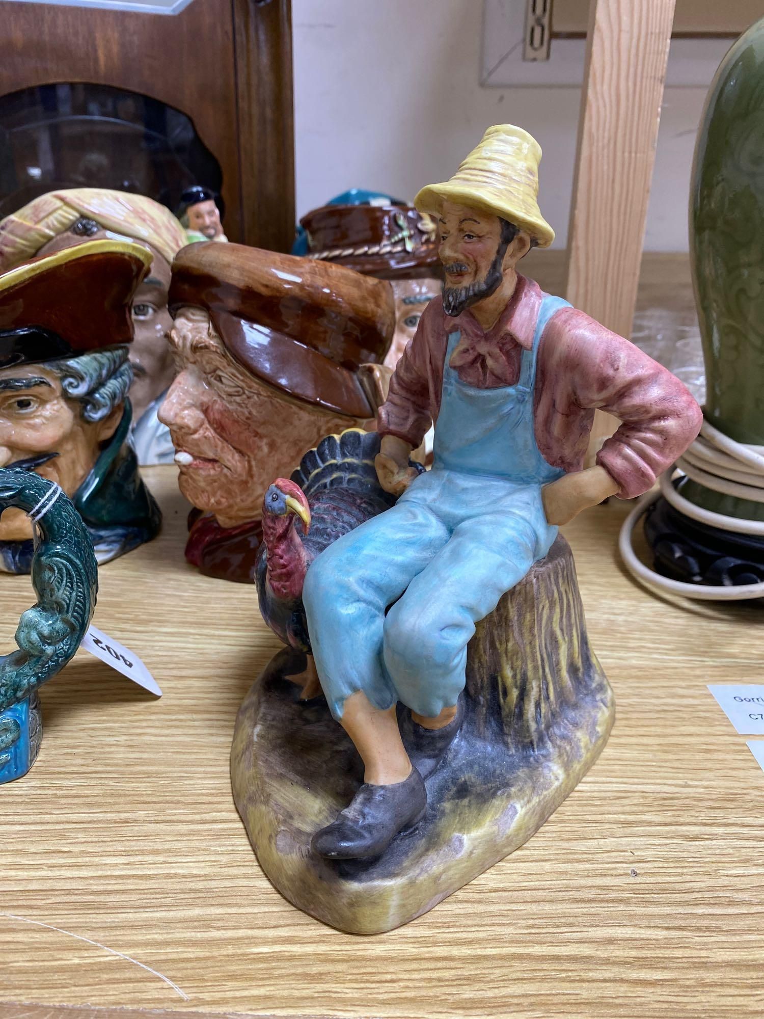 Ten mixed Royal Doulton character jugs and a figure Thanksgiving, HN2446